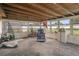 Enclosed sun room with multiple windows and outdoor access at 7608 Dale Dr, Port Richey, FL 34668