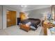 Bedroom with neutral walls, comfortable bed, and ample closet space at 8914 Schrader Blvd, Port Richey, FL 34668