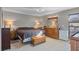 Spacious bedroom with a comfortable bed, dresser, and natural light at 8914 Schrader Blvd, Port Richey, FL 34668