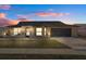 Charming single-story home showcasing a well-maintained lawn and attached two-car garage at 8914 Schrader Blvd, Port Richey, FL 34668