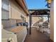 Outdoor area with a covered seating area, dining set, and grill at 8914 Schrader Blvd, Port Richey, FL 34668