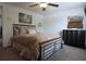 Bedroom with carpet floors, a ceiling fan, and seaside decor at 9003 Lido Ln, Port Richey, FL 34668