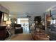 Bright living area with seamless flow to dining, offering a flexible living space at 9003 Lido Ln, Port Richey, FL 34668