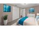 Tastefully furnished bedroom with soothing decor, carpet, closet, and ample space for relaxation and rest at 9016 Unicorn Ave, Port Richey, FL 34668