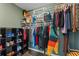 Spacious walk-in closet with ample shelving and hanging space for organized storage at 9016 Unicorn Ave, Port Richey, FL 34668