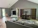 Open living room featuring a neutral color palette and lots of natural light at 9155 Pemberton St, Spring Hill, FL 34608