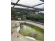In ground pool, showing the need for cleaning and some repairs to the pool's surface at 9155 Pemberton St, Spring Hill, FL 34608
