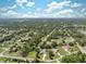 Drone shot of the home surrounded by lush landscaping, showing the peaceful neighborhood at 9431 Amidon St, Spring Hill, FL 34608
