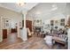 Cozy living room with wood-look floors, fireplace, and unique decor perfect for relaxation at 9431 Amidon St, Spring Hill, FL 34608