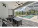 Beautiful screened-in pool area perfect for relaxing or entertaining guests at 9431 Amidon St, Spring Hill, FL 34608