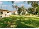 Wide backyard provides ample space, mature trees, and a serene environment at 9630 Eldridge Rd, Spring Hill, FL 34608
