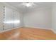 Light, airy bedroom with white trim and modern ceiling fan at 1010 Teal Pointe, Tarpon Springs, FL 34689