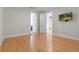 Light and airy bedroom with access to on-suite bath, and tv at 1010 Teal Pointe, Tarpon Springs, FL 34689