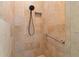 Custom tiled shower features bench seating and modern fixtures at 1010 Teal Pointe, Tarpon Springs, FL 34689