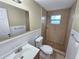 Cozy bathroom with updated shower and modern sink and fixtures at 10135 Glen Moor Ln, Port Richey, FL 34668