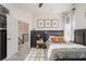 Cozy bedroom with stylish decor, a comfortable bed, and gray accents at 10342 Altrara Way, Trinity, FL 34655