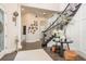 An entranceway with staircase, tile floors, and decorated walls at 10342 Altrara Way, Trinity, FL 34655