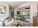 Open foyer with high ceilings, wrought iron banister and natural light at 10342 Altrara Way, Trinity, FL 34655