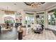 Inviting living room with ample natural light, elegant furnishings, and a view of the outdoor area at 10342 Altrara Way, Trinity, FL 34655