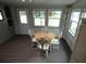 Cozy dining area with hardwood floors and plenty of natural light at 1042 Howell Ave, Brooksville, FL 34601