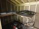 Unfinished shed interior with equipment and supplies ready for customization and storage at 1042 Howell Ave, Brooksville, FL 34601