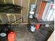 Unfinished shed interior with supplies and equipment, ready for customization and storage at 1042 Howell Ave, Brooksville, FL 34601