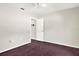 Cozy bedroom showcasing a standard closet and plush carpeting at 10935 New Brighton Ct, New Port Richey, FL 34654