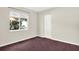 Neat bedroom featuring plush carpeting and a standard double door closet at 10935 New Brighton Ct, New Port Richey, FL 34654