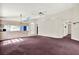 Open-concept living room with modern lighting and an inviting atmosphere at 10935 New Brighton Ct, New Port Richey, FL 34654