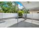 Enclosed screened patio overlooking the backyard at 10935 New Brighton Ct, New Port Richey, FL 34654