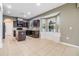 Well-lit kitchen features stainless appliances, a central island and a breakfast nook with bench seating at 1104 Ketzal Dr, Trinity, FL 34655