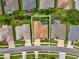 Aerial view of property with pool, screened in lanai, and neatly landscaped yard enclosed by white border at 11144 Brambleleaf Way, Hudson, FL 34667