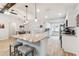 Bright and spacious kitchen featuring an island with seating and stainless steel appliances at 11280 Sedgefield Ave, Spring Hill, FL 34608