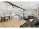 Inviting living space with open layout featuring modern finishes and a seamless flow to the dining and kitchen areas at 11280 Sedgefield Ave, Spring Hill, FL 34608
