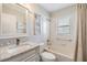 Clean and bright bathroom with tub, vanity, and marble countertop at 1242 Almondwood Dr, Trinity, FL 34655