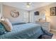Cozy bedroom with twin beds, a dresser, and a bright window at 1242 Almondwood Dr, Trinity, FL 34655