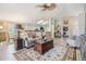Comfortable living room adjacent to kitchen and dining area; great layout for entertaining at 1242 Almondwood Dr, Trinity, FL 34655