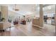 Open concept living room with vaulted ceilings, hardwood floors, and an inviting atmosphere at 1242 Almondwood Dr, Trinity, FL 34655