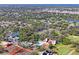 Wonderful aerial view of community amenities including the pool, golf course, and tennis courts at 13009 Wedgewood Way # 63-D, Hudson, FL 34667