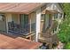 Exterior of condo with a balcony, stairs and earth tone paints, offering outdoor living space and convenient access at 13009 Wedgewood Way # 63-D, Hudson, FL 34667