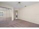 Bedroom with a mirrored closet and natural light, providing ample storage at 13491 Coronado Dr, Spring Hill, FL 34609