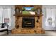 Detailed view of the stone fireplace, mantel decorations, and hearth at 1376 Fayetteville Dr, Spring Hill, FL 34609