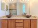 Bathroom with dual vanity, glass enclosed walk-in shower and granite countertop at 13772 Dunwoody Dr, Spring Hill, FL 34609