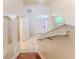 Foyer view from above showing tile flooring and staircase leading to the entryway at 13772 Dunwoody Dr, Spring Hill, FL 34609