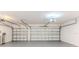 Spacious garage with two paneled doors, offering ample storage and parking at 13772 Dunwoody Dr, Spring Hill, FL 34609