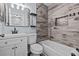 Modern bathroom featuring a tub with tiled surround and a stylish vanity at 13821 Judy Ave, Hudson, FL 34667