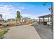 Exterior shot showcasing the home's private dock, outdoor shower and screened porch at 13821 Judy Ave, Hudson, FL 34667