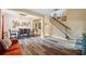 Dining area showcasing stylish lighting, staircase, and an open layout at 1410 Halapa Way, Trinity, FL 34655