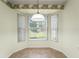Bright dining area with bay windows offering natural light at 1415 Pinewood Hills Ct, Spring Hill, FL 34606