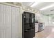 Well-equipped kitchen with modern stainless steel appliances at 1415 Pinewood Hills Ct, Spring Hill, FL 34606
